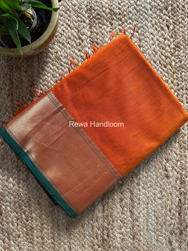 Exclusive Maheshwari Rust Orange Zari Border Saree EZ039