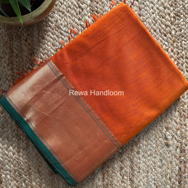 Exclusive Maheshwari Rust Orange Zari Border Saree EZ039