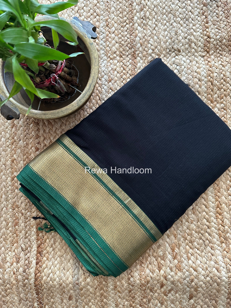 Exclusive Maheswari Self Checks Black Saree MCS085