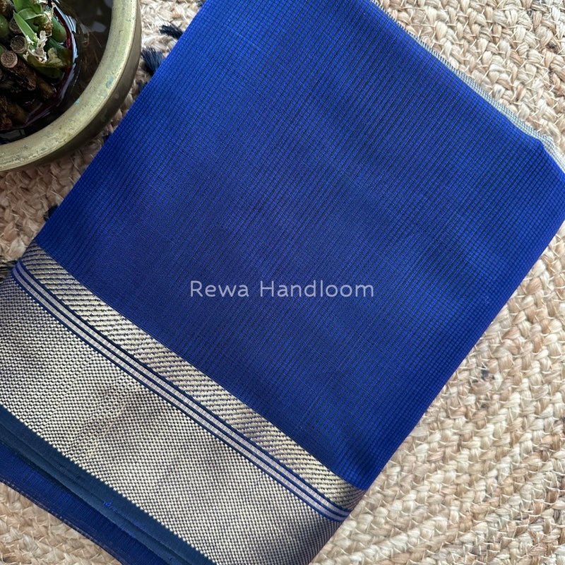 Exclusive Maheswari Self Checks Saree